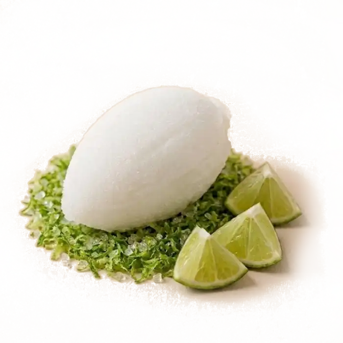 Una bola de sorbete de lima artesanal, crujiente y refrescante, con una textura vibrante